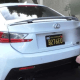 Why do Teslas not have front license plates?